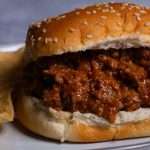 Easy Sloppy Joes on a bun with tortilla chips.