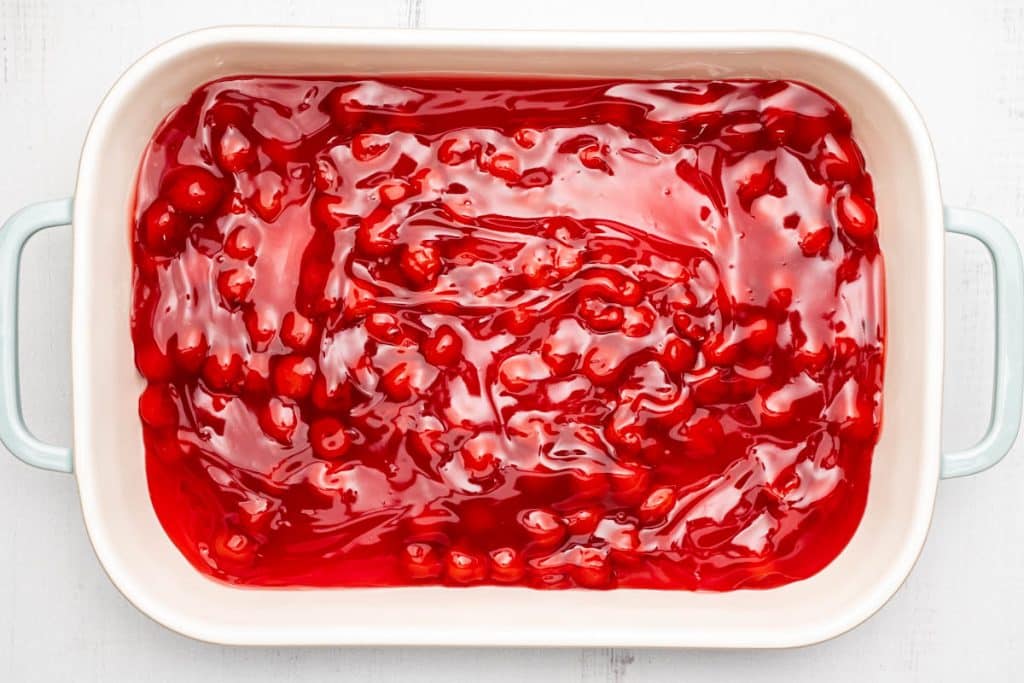 Cherry pie filling in a baking dish.