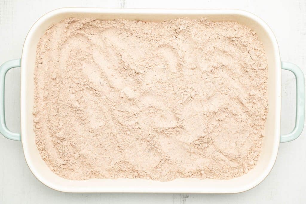 Cake mix in a rectangular baking dish.