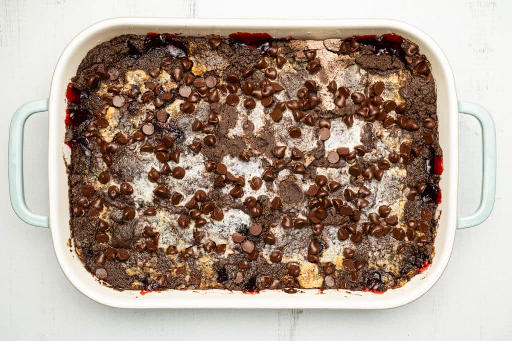 Chocolate cherry dump cake in a rectangular baking dish.